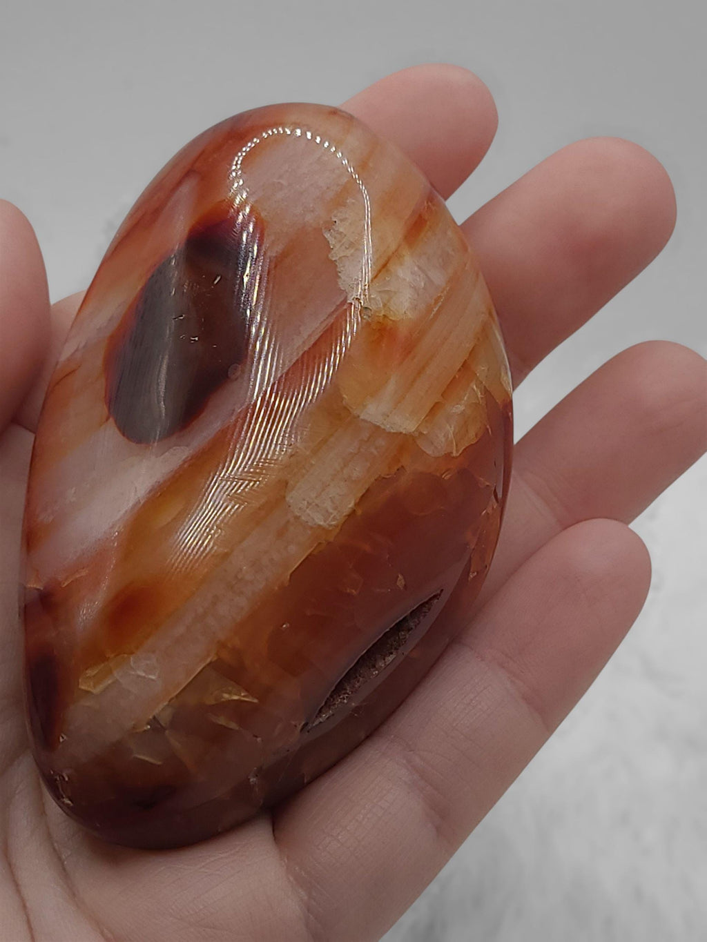 Polished Carnelian Palm Stone: Orange Crystal for Confidence and Motivation, Root Chakra Crystal