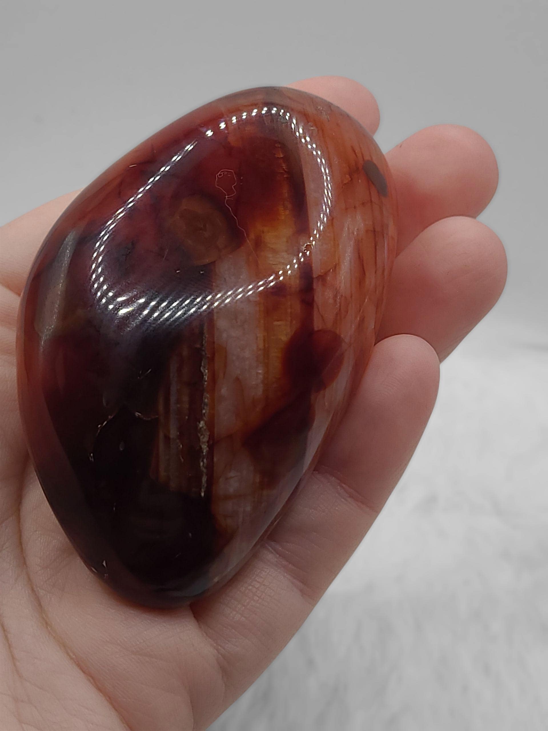 Polished Carnelian Palm Stone: Orange Crystal for Confidence and Motivation, Root Chakra Crystal