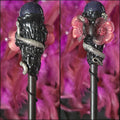The Craft Kitten handcrafted blue goldstone crystal wand with a silver snake charm and pink floral accents.